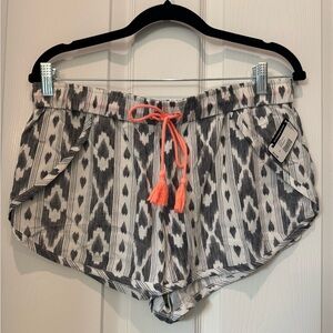 NWT beach shorts. Black/white and coral color.
